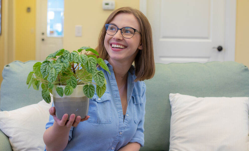Oh, Hello Living Holding a Plant